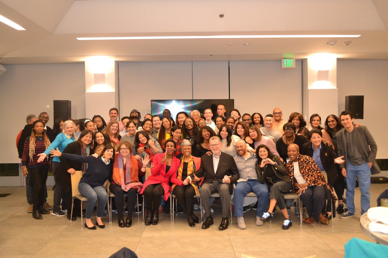 A group of participants in an ICAP cohort posing for a picture