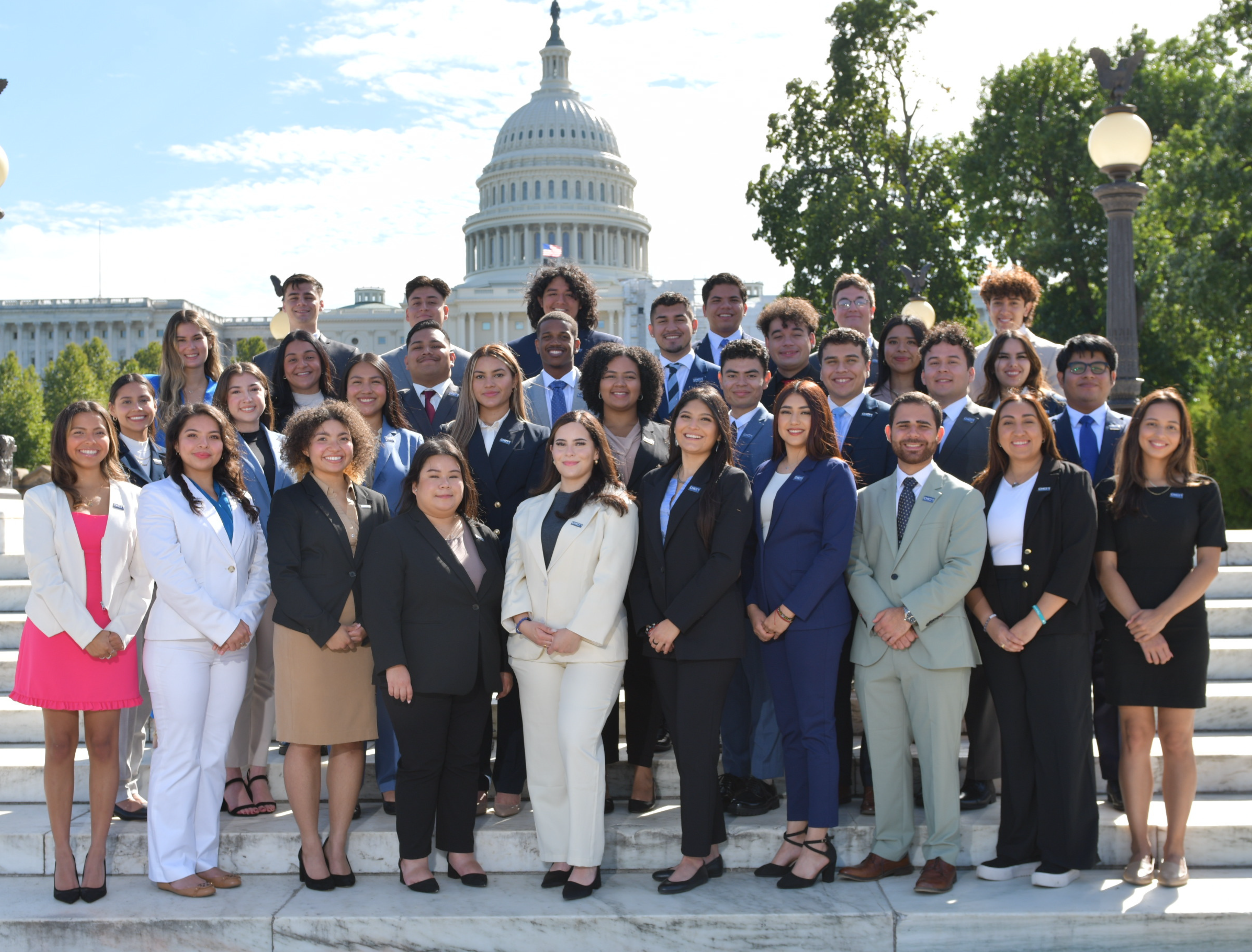 CHCI community stands together in front of Capitol buildling