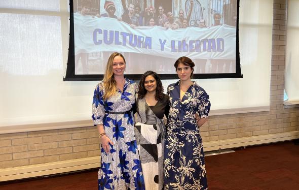 Professor Marie Berry, PhD student Sinduja Raja, and Cuban activist Carolina Barrero pose for a picture before the event. 