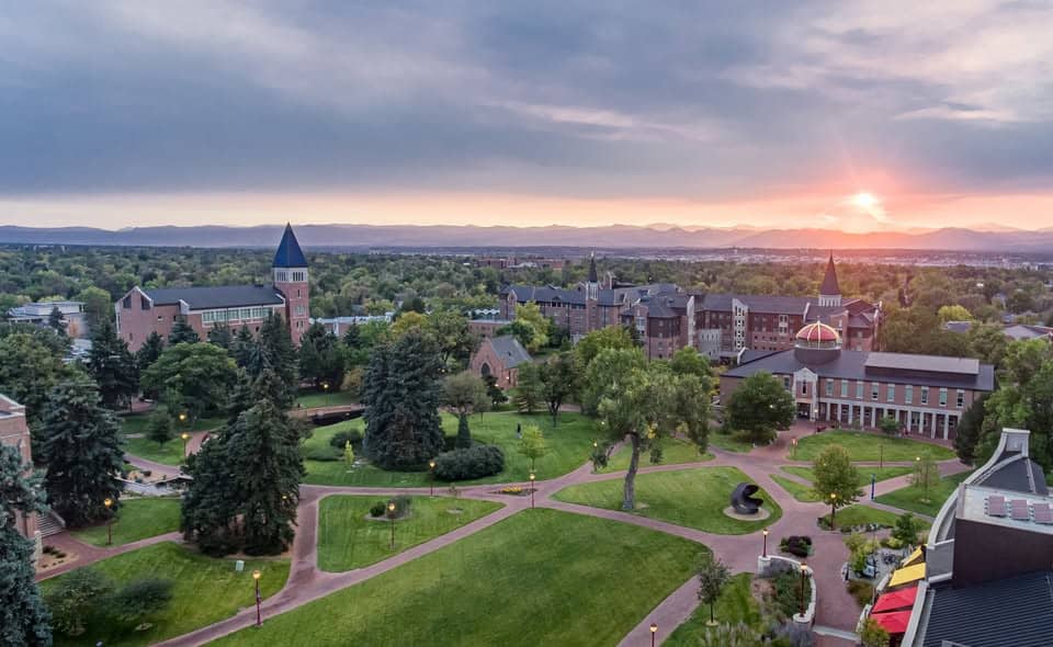University of Denver exterior aerial looking West during sunset 2024